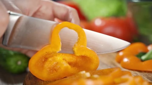 Vibrant Bell Pepper Sliced on Cutting Board