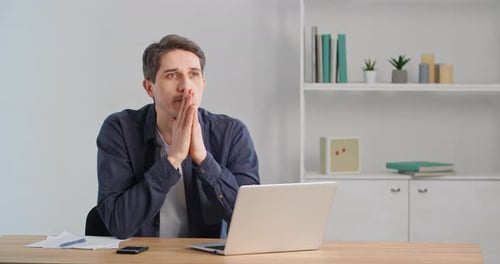 Smart Focused Businessman 30s Guy Pensive Adult Man Thoughtful Freelancer Sits at Table Home Office