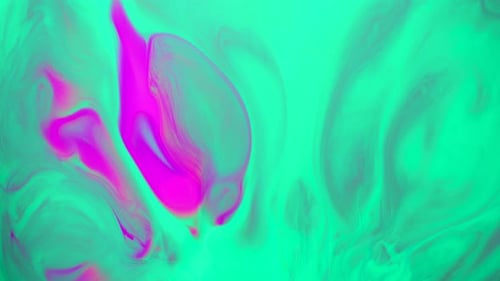 Flüssige rosa und türkisfarbene Farbe