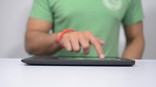 Young Man Using Tablet