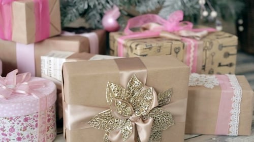 Pile of Beautiful Christmas Gifts With Pink Bows