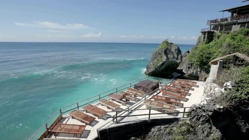 Tropical Beach Resort with Lounge Chairs by Ocean