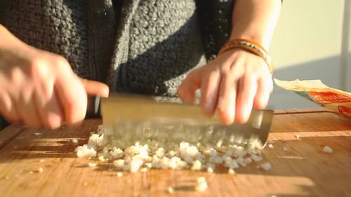 Female Hands Cutting Vegetables On Wooden Board 1