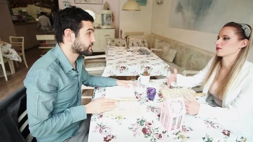 Couple In Restaurant Reading Menus 5