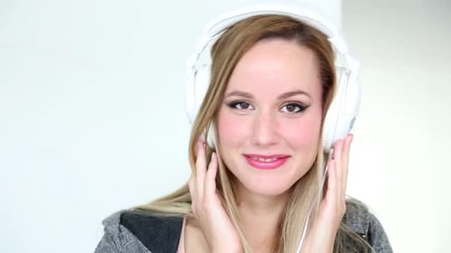 Woman Wearing Headphones Smiling Close Up