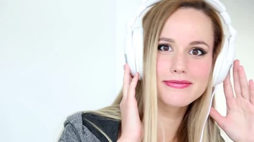 Woman Listening to Music With Headphones