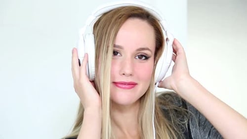 Woman Wearing Headphones Smiling Close-up