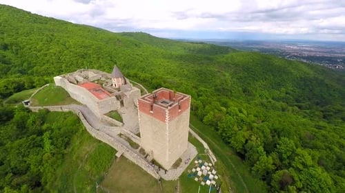 Aerial View Of Fort Medvedgrad With Forest Around It And Cityscape In Distance. 4