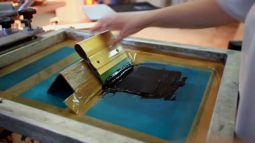 Screen Printing Process in a Manufacturing Workspace
