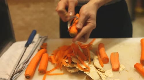 Chef Peeing Carrots In Restaurant 3