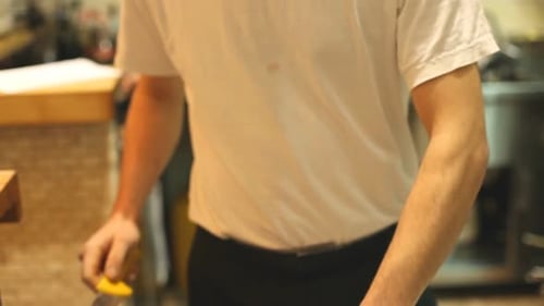 Chef Slicing Raw Meat with Sharp Knife