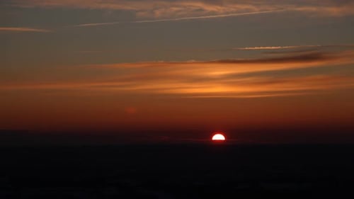 Majestic Sunset with Vibrant Colors and Cloudscape