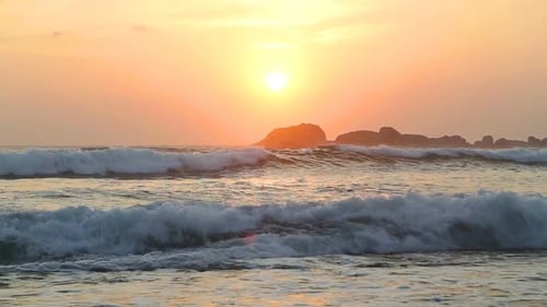 Ocean View In Hikkaduwa In Sunset With Waves Splashing The Beach. 10