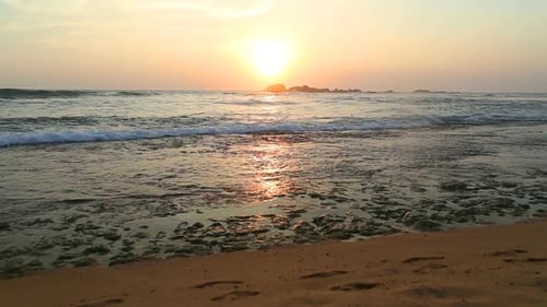 Ocean View In Hikkaduwa In Sunset With Waves Splashing The Beach. 7