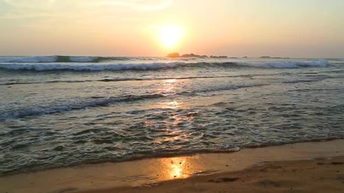 Ocean View In Hikkaduwa In Sunset With Waves Splashing The Beach. 8
