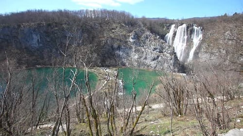 Scenic Waterfall and Lake View