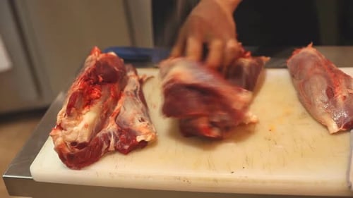 Putting Salt On Meat