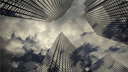 Skyscrapers Reach High into Cloudy Sky