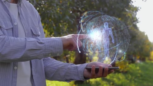 Man Interacts with Human Hologram on Phone Outdoors