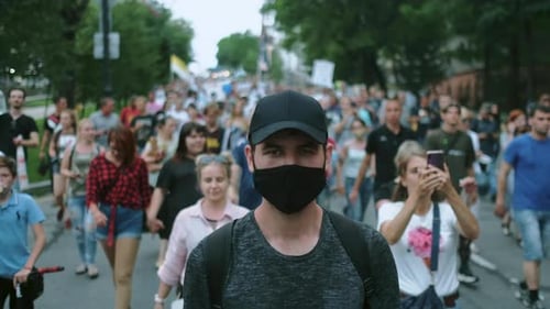 Crowd Walking on City Street