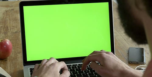 Typing on Laptop with Chroma Key Green Screen