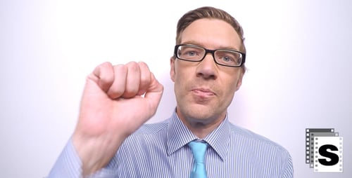 Man in Glasses Looks Around and Knocks