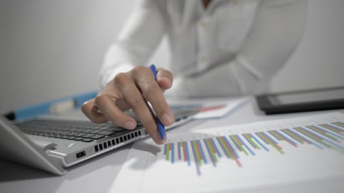 Analyzing Financial Data at a Bright Desk