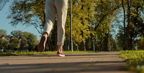 Young Girl Running in the Open Air