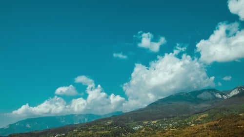 Cumulus Clouds Over Mountain In Crimea