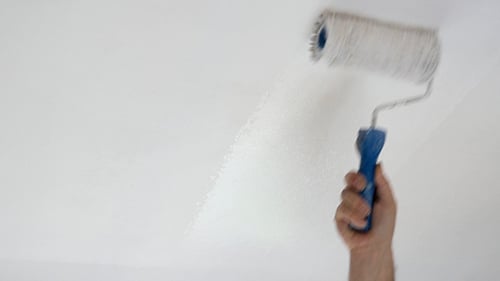 Painting a White Wall with a Roller