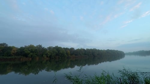 Sunrise in Fog on River Water.