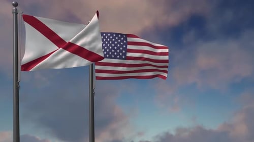 Waving Alabama and USA Flags Against Cloudy Sky