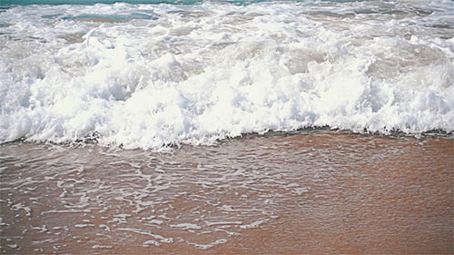 Ocean Waves With Sun Reflection