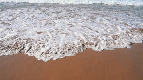 Ocean Waves With Sun Reflection