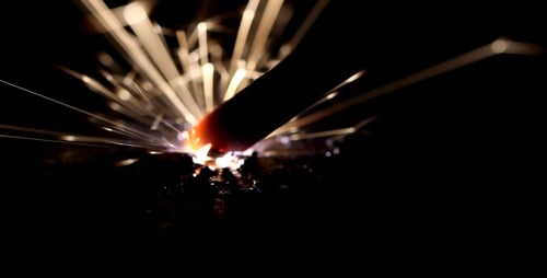 Welding Sparks and Flame at Night Close Up