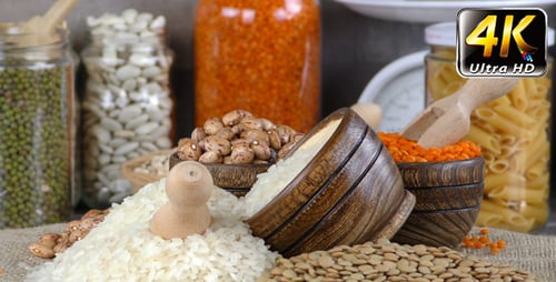 Uncooked Legumes, Pasta and Rice in Bowls and Jars