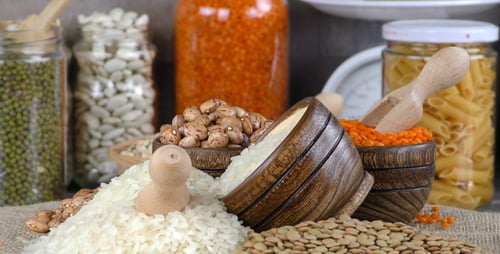 Variety of Dry Foods in Jars and Bowls