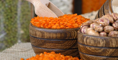Lentils and Pinto Beans in Wooden Bowls