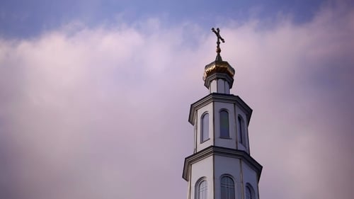 Chapel On The Background Flying Clouds