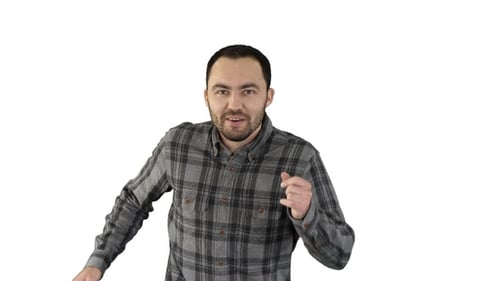 Man Dancing and Smiling Against White Background