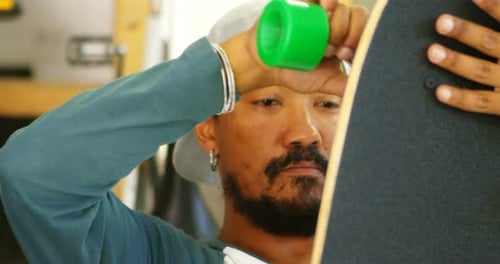 Skateboard Assembly with Green Wheel Close Up Shot