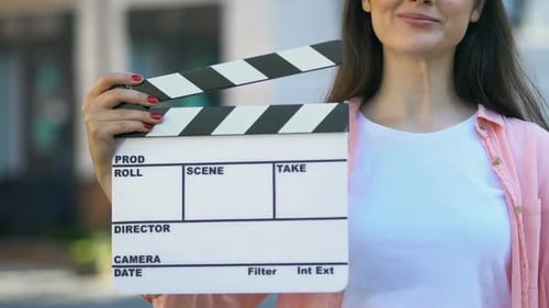 Young Woman Holding Clapperboard, Assistant Film Director, Video Production
