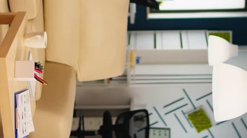 Interior of Cozy Light Company Room with Small Table and Confortable Couch