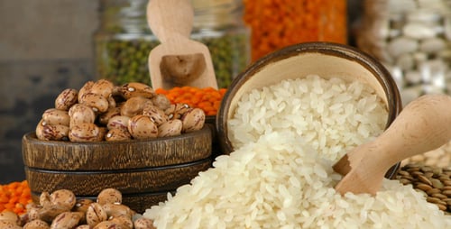 Variety of Dried Beans and Rice in Wooden Bowls
