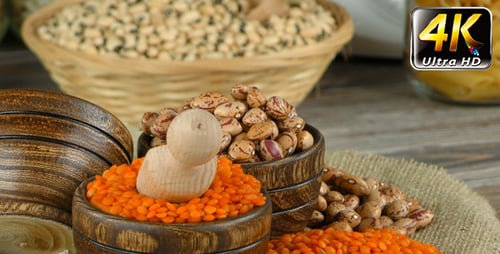 Assorted Dried Legumes in Rustic Wooden Bowls