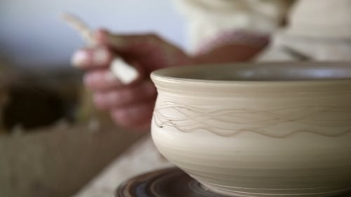 Ceramic Bowl Being Created By Potter