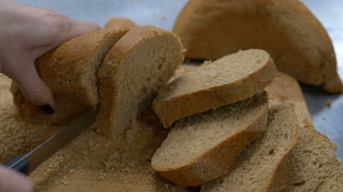 Slicing Multigrain Bread with Sharp Knife