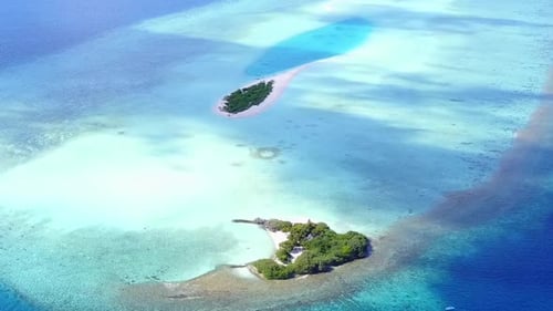 Aerial drone seascape of tropical island beach by lagoon with sand background