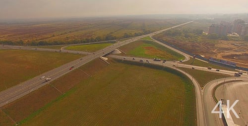 Cars at complex interchange and highway