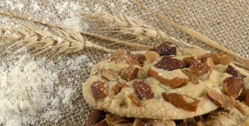 Delicious Homemade Cookies with Almonds on Burlap